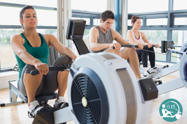 Group of people rowing in their HIIT class at MB Fitness Studio